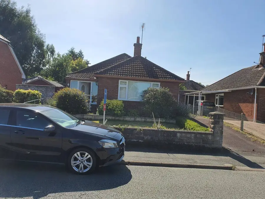 Dated brick bungalow in Hawarden before dormer conversion